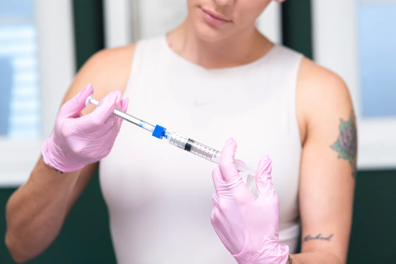 Measuring a syringe before treatment