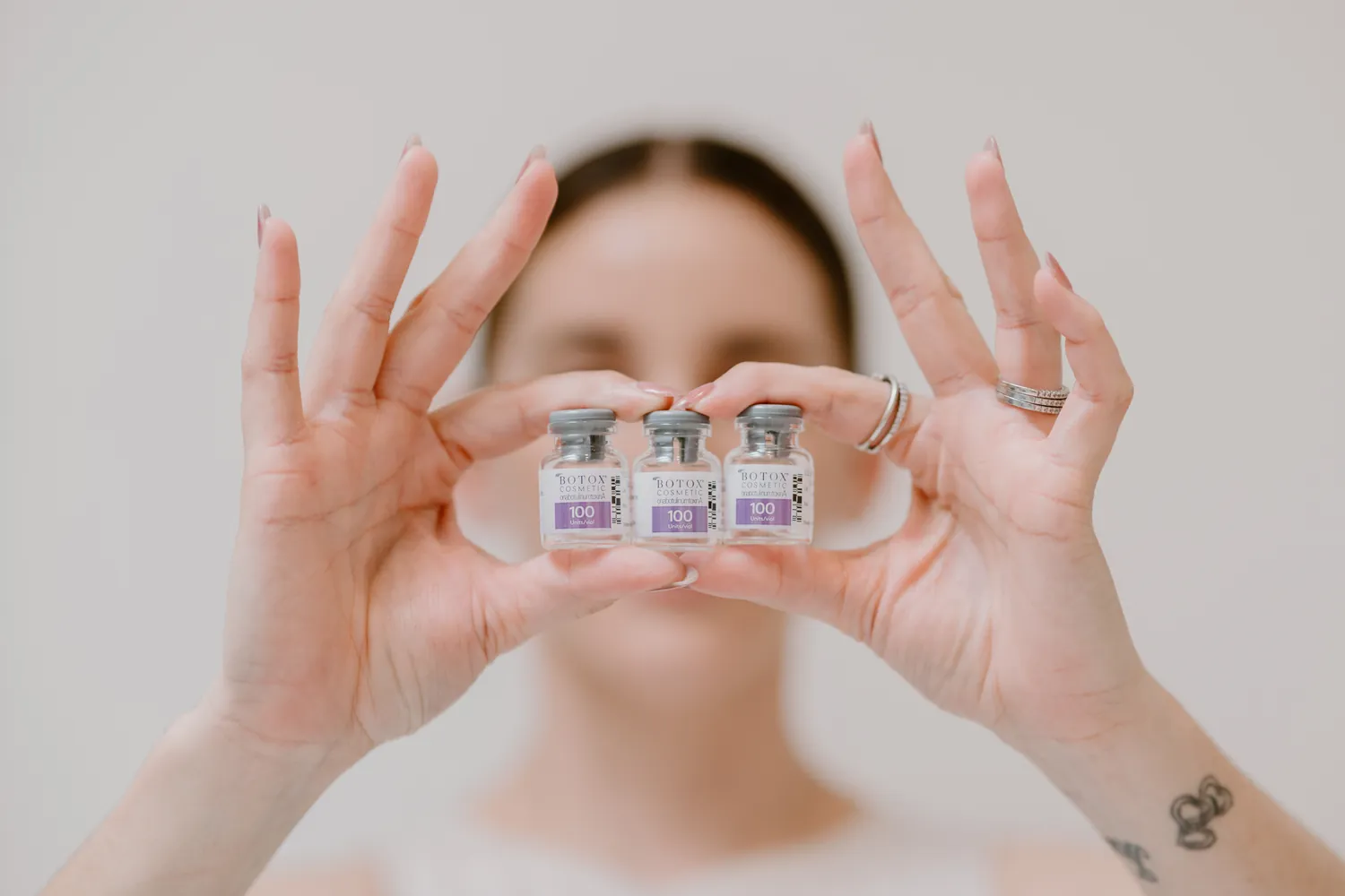 Client holding wellness injectables